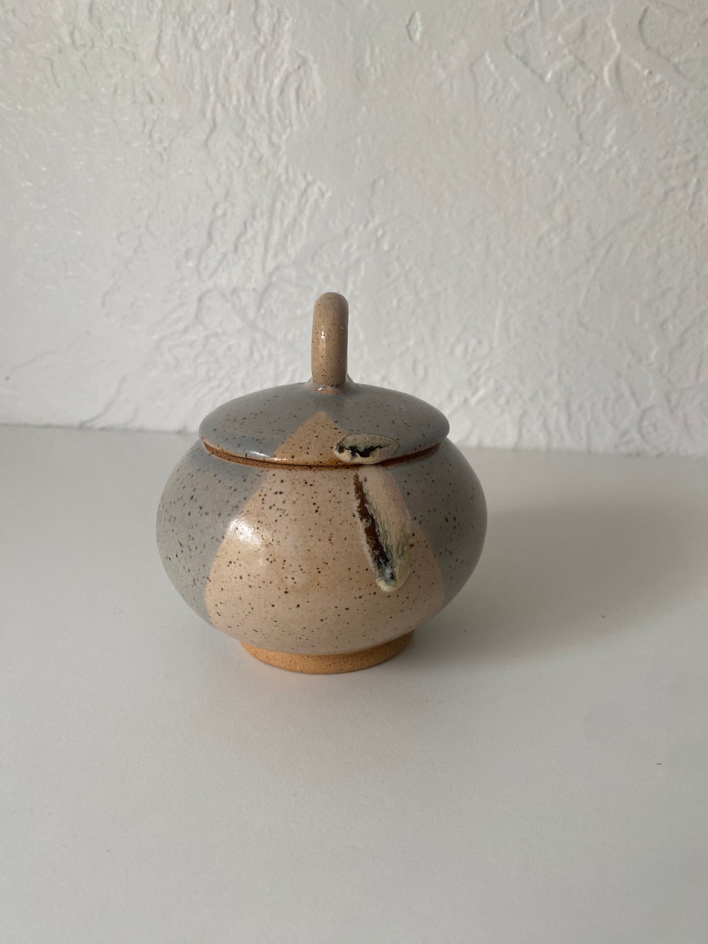 small lidded jar