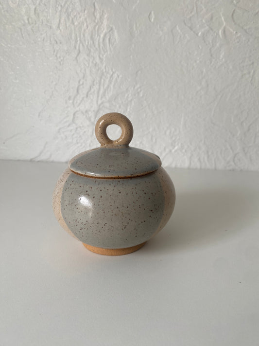 small lidded jar
