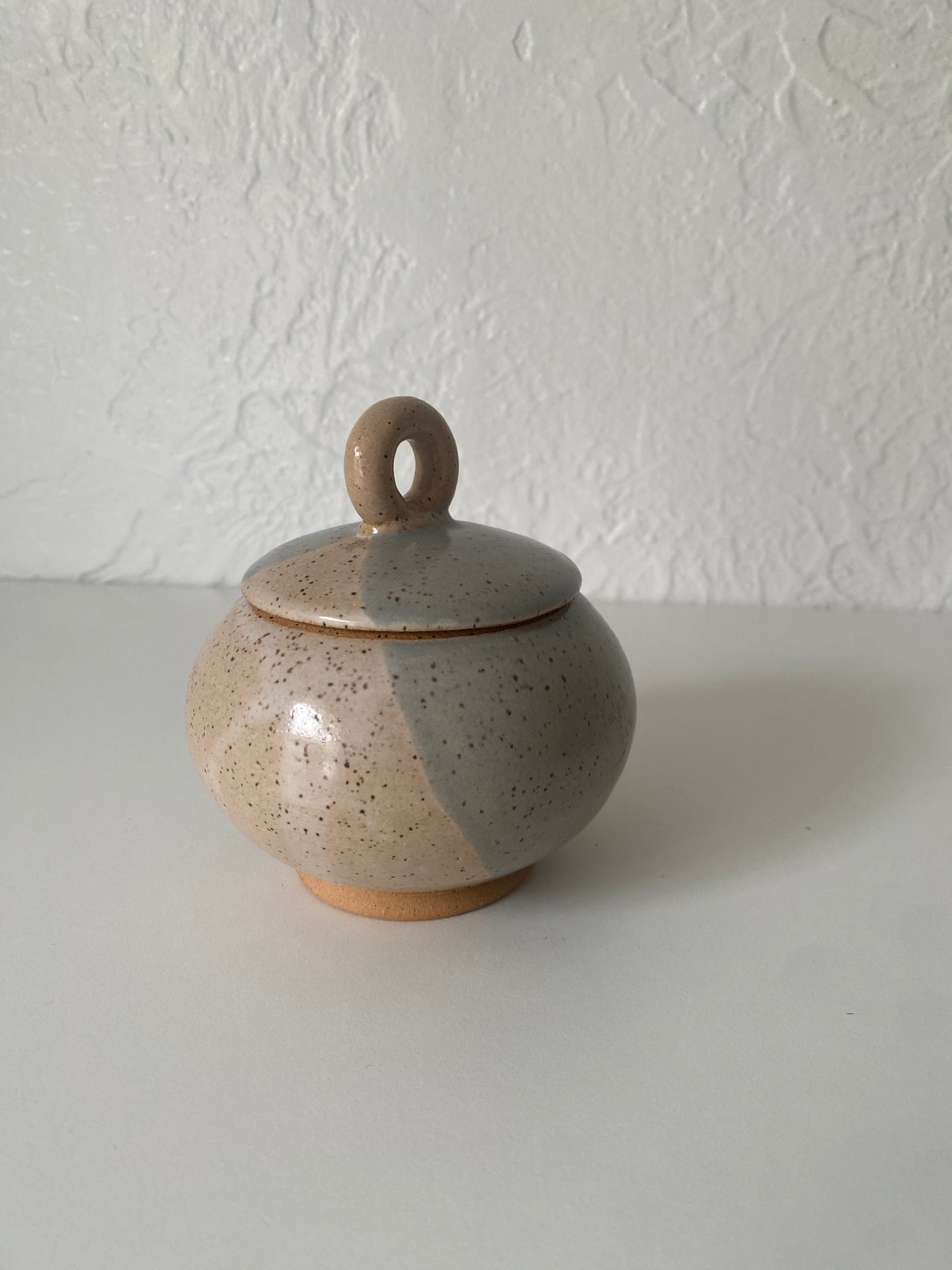 small lidded jar